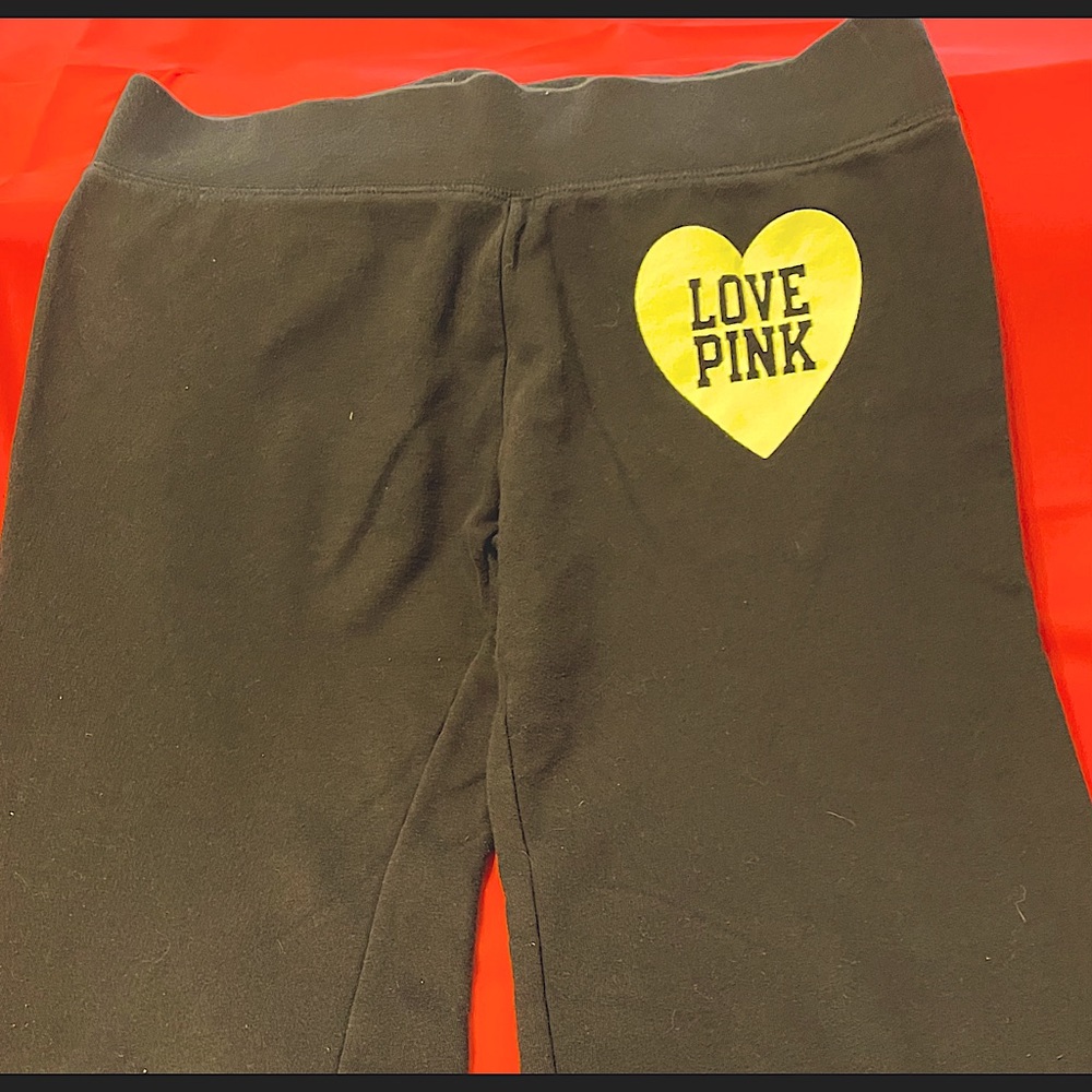 PINK , Victoria Secret, Black Lounge/sweat Pants with a yellow heart. size M